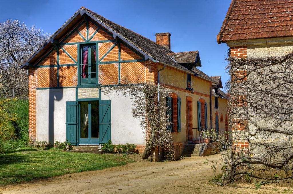 Cottages De Chateau De Vaux Yvré-lʼÉvêque Exterior foto